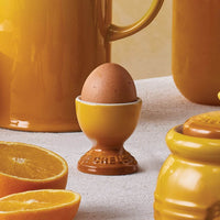 71702006720099-le-creuset-stoneware-egg-cup-nectar-lifestyle-11500x1500_10663765053191.jpg